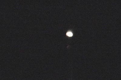These are 2 video frames I shot from 2001 ufodays.
They are consecutive frames- only 1/30 sec. apart